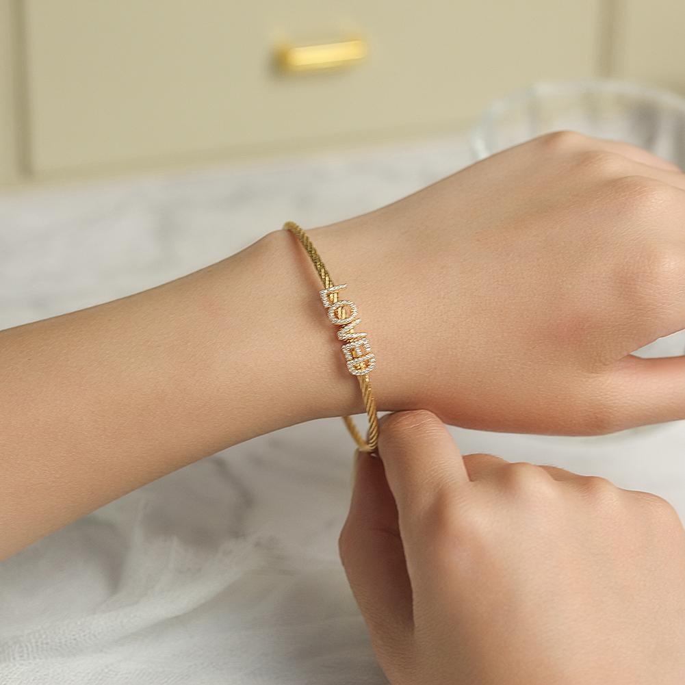"LOVED" Paved Bangle in 14K Plated Gold Bracelet